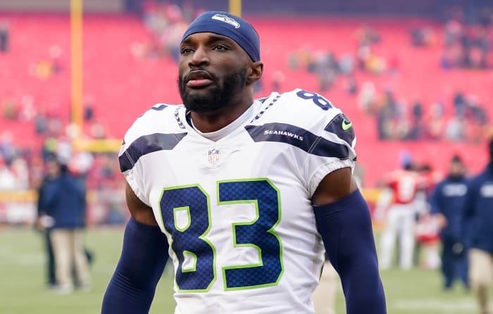 Seattle Seahawks wide receiver Dareke Young (83) leaves the field after a game against the Kansas City Chiefs at GEHA Field at Arrowhead Stadium.